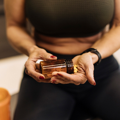 man curling dumbbell