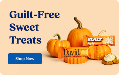 Guilt-Free Sweet Treats. Shop Now. David and Built Puff bars with pumpkins in the background.