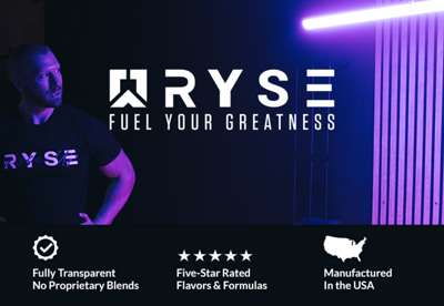 Man in black shirt standing under purple light