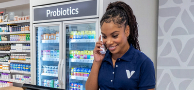 health enthusiast on the phone smiling